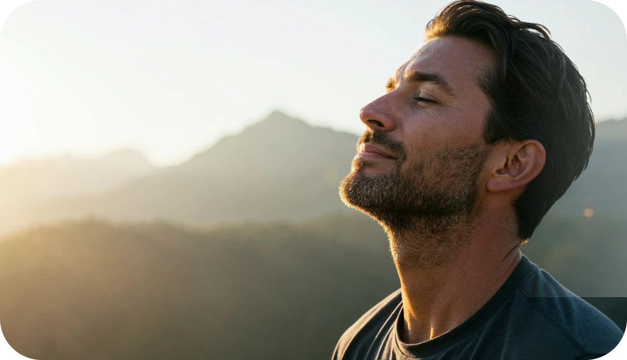 Man breathing mountain air